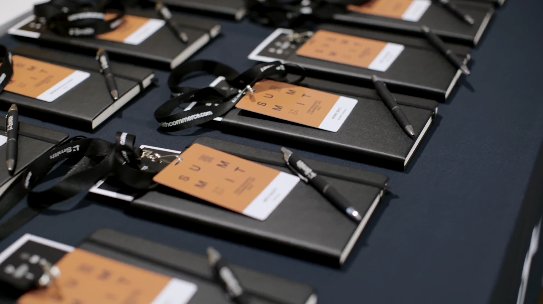 Image of notebooks with pens and Smith badges